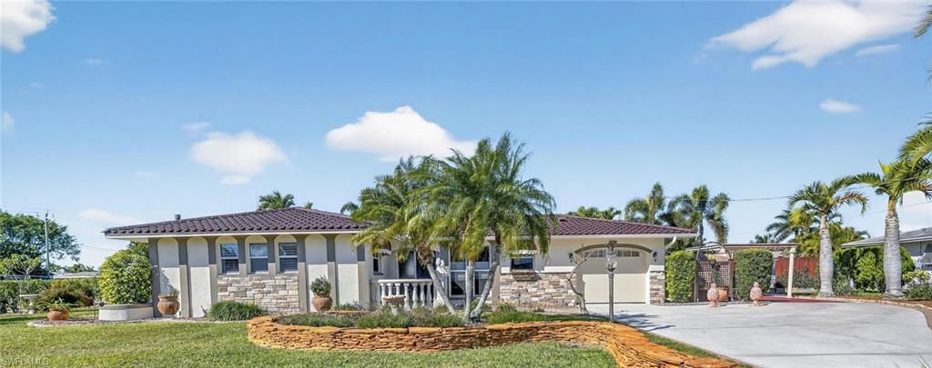 Photo of 5266 Wisteria CT, CAPE CORAL, FL 33904 (MLS # 226005338)