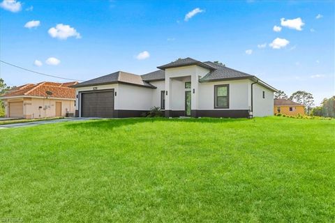 Photo of 628 Beach AVE S, LEHIGH ACRES, FL 33974 (MLS # 226017118)
