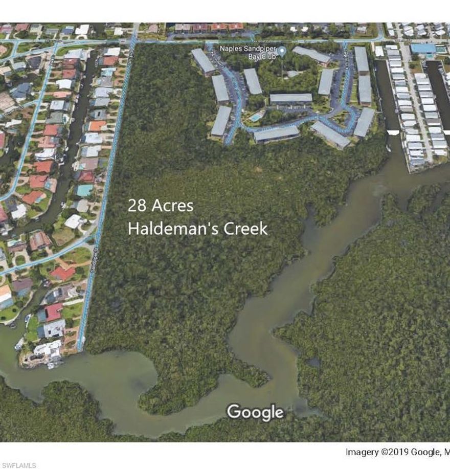 A fantastic and unique opportunity to own approximately 28 acres on Naples Bay, mere minutes from downtown Naples.  Sitting on Haldeman's Creek, this property has direct access to Naples Bay, and easy access to public roads and utilities.  An unbelievable opportunity for the right Buyer.