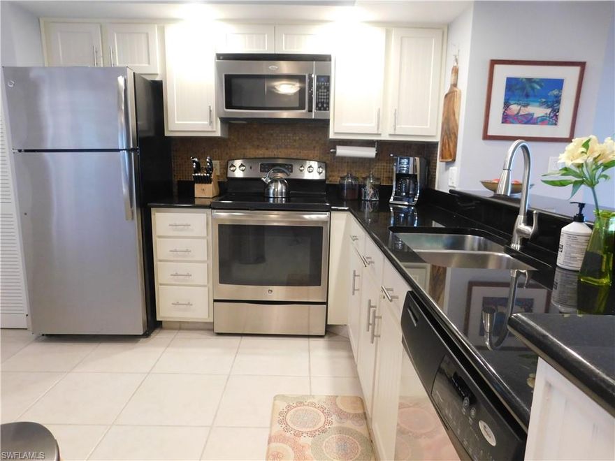 You will be awed walking through the door. Check out the view as soon as you step in to this tastefully and comfortably 4th floor unit. Decorated with Pier I and Pottery Barn furnishings. Sit back and enjoy the gorgeous view of the Georgia Fruit Creek from the lanai, living room, dining room and kitchen, as well as the master bedroom. Updated kitchen with white Shaker Style Beadboard cabinetry, stainless steel appliances, contrasting granite countertops and recessed lighting. Updated bathroom vanities and showers in both the master and the guest baths, feels like you just stepped into a relaxing retreat. New tile flooring in the master bedroom. Stevens Landing condo association amenities include assigned boat docks, dry boat storage, pool, hot tub, sauna, grilling area, tennis and pickleball courts. The grounds are well maintained and beautifully landscaped. Feel as if you are on vacation at a beautiful resort everyday when you own at Stevens Landing