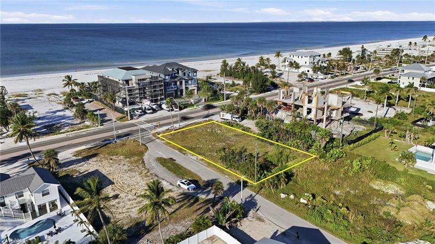 Build Your DREAM home or HIGH-INCOME vacation rental on this oversized 70’ x 150’ corner lot, ideally positioned just steps across from the BEACH. This 1/4 Acre CORNER Direct BEACH ACCESS parcel offers panoramic Gulf and beach views with breathtaking sunsets, this property captures the essence of coastal living at its finest. Imagine living in your 6 + Bedroom home, sitting on the deck watching sunsets entertaining your friends. This cleared and ready-to-build homesite provides side street access, offering flexibility for your custom design, parking, and layout. Zoned for weekly rentals, the lot delivers outstanding investment potential in one of Southwest Florida’s most sought-after beach communities. Whether you’re planning a luxurious personal retreat, a vacation rental powerhouse, or a showcase coastal residence, this property is the perfect canvas for your vision.

Enjoy a premier mid-island location that combines tranquility with accessibility. You’ll be within walking or biking distance to Margaritaville Resort, Publix, the marina, and an array of local restaurants, shops, and beach bars. The property’s convenient proximity to Bonita Springs, Naples, and Southwest Florida International Airport makes it ideal for both residents and visitors seeking effortless travel connections.

Embrace the vibrant Fort Myers Beach renaissance—a community reimagining its future while preserving the charm and character that make it a beloved coastal destination. Here, you can wake up to the sound of the waves, take in endless Gulf sunsets, and experience the true beach lifestyle every day.

Builder introductions are available to assist with your custom build, ensuring a seamless process from vision to completion. 

Don’t miss this rare chance to own a prime piece of paradise on Fort Myers Beach. Build, invest, and create your legacy along Florida’s most iconic shoreline.
