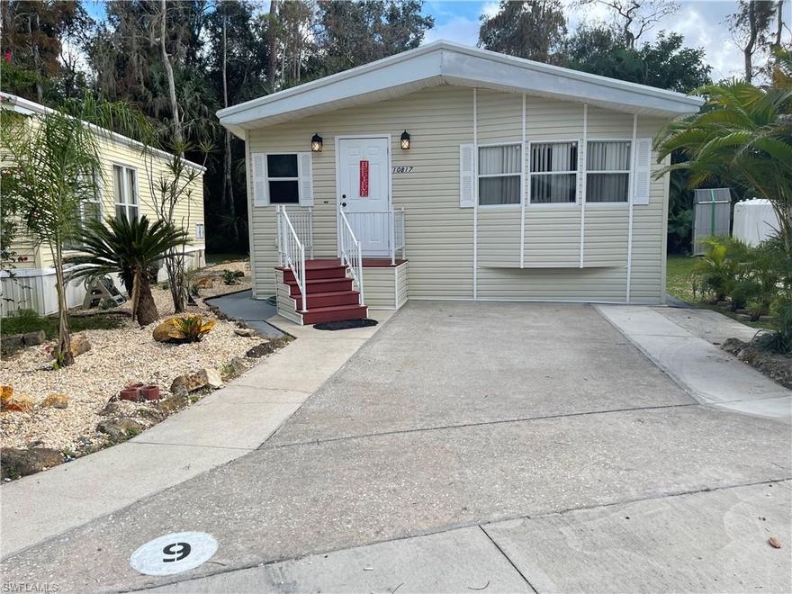 RARE OPPORTUNITY!!! Turnkey 2BR/2BA Newly revamped Unit in DESIRABLE CORKSCREW WOODLANDS PARK, 
a 55+ Community with 2 lighted tennis courts, 4 Pickle Ball, 2 Bocce, 8 Shuffleboard and 4 horseshoe courts with bleachers, 2 Paddle Boats for the lake, Nature trails for walking, biking or hiking (and golf carts), 18 Hole Mini Golf, 6700 SF Clubhouse with attached screen room, Large Swimming Pool and Spa - You get the picture - You'll never be bored or lonely with 600+ units in the park - Enjoy your spacious back yard with patio and deck - your own private paradise - Inside is an open living plan with granite counters, stainless appliances, recessed lighting, new vinyl waterproof floors throughout - lots and lots of storage space, cabinets, drawers - in unit washer/dryer, high ceilings, formal dining area, A/C 2006, Roof 2010! - New shopping under construction at the entrance Corkscrew Woodlands Blvd - It's ~2 miles to the Miromar Outlets and I75 N/S - Live Luxuriously in Centrally located Estero and enjoy all of SWFL -  - OH, did I mention that THIS unit comes with a Murphy Bed for added living space...AND a separate storage unit for a nominal fee of $99/year???? And that's not all!!!