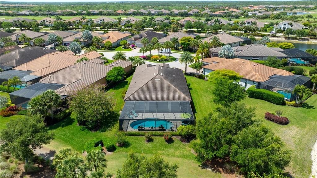 Photo of 9282 Rialto LN, NAPLES, FL 34119 (MLS # 226016012)