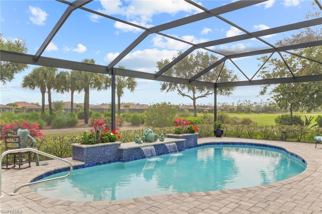 Photo of 9282 Rialto LN, NAPLES, FL 34119 (MLS # 226016012)
