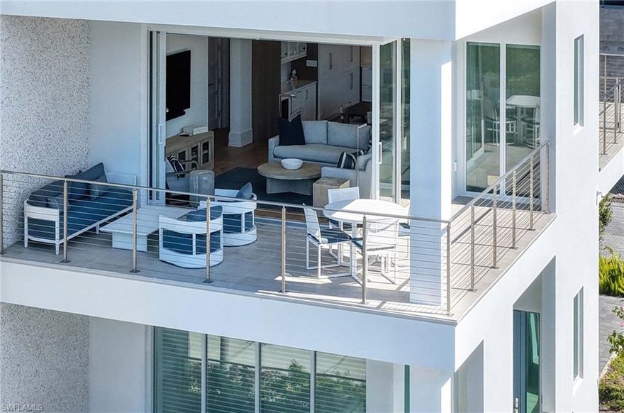 Rarely available and widely regarded as one of the most desirable residences in the building, this south corner unit at The Mark on 8th offers exceptional privacy, natural light, and refined coastal living in the heart of Olde Naples. With a private end of hall entry and an expansive wraparound lanai capturing coveted southern and western exposures, the home lives bright, open, and effortlessly inviting.

The residence enjoys a peaceful setting while remaining just moments from the amenities.  Located on the second level, it provides the security and peace of mind discerning buyers value, along with convenient access to the pool, golf simulator, and club room. The lanai functions as an inviting outdoor living space ideal for relaxing or entertaining.

Built in 2024, The Mark on 8th is a luxury boutique community and one of Olde Naples’ most sought after addresses. This thoughtfully designed floor plan offers approximately 1,942 square feet under air with three bedrooms and three and a half baths. Offered furnished with brand new pieces, many from Restoration Hardware, the residence is in like new condition and has been very lightly lived in, delivering turnkey luxury ideal for full time living or lock and leave ownership.

Wide plank wood flooring runs throughout the main living areas and bedrooms, complemented by tall baseboards and tray ceilings with tongue and groove detail. Built in closets and motorized Hunter Douglas shades provide immediate comfort and privacy.

The open concept kitchen is both elegant and functional, featuring Sub Zero refrigeration and beverage chiller, a Wolf gas range and microwave, quartz countertops, a striking tile backsplash, pot filler, and a spacious layout ideal for everyday living and entertaining. The dining area includes a stylish dry bar, while the living room opens through dramatic sliders to the wraparound lanai, where ceiling beams and tongue and groove detail enhance the inviting outdoor space.

The primary suite offers a private retreat with its own balcony, walk in closet, and ceiling detail. The spa inspired bath features a freestanding soaking tub, glass enclosed shower with rainhead and handheld fixtures, bench seating, dual vanities, and a separate water closet. Each guest bedroom includes an en suite bath, ensuring comfort and privacy for visitors.

Impact glass windows and doors, natural gas service, UV HVAC system, two assigned garage spaces, and a private storage locker provide everyday convenience and peace of mind.

The Mark on 8th features just 24 residences and resort style amenities including a pool, spa, fire pit, grilling area, club and fitness rooms, and golf simulator.

Ideally located west of US 41, this residence is moments from Fifth Avenue South, world class dining, shopping, and the Gulf beaches. A must see.