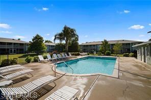 Photo of 130 Cypress WAY E #1, NAPLES, FL 34110 (MLS # 226024439)
