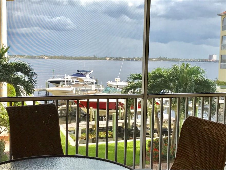 Reduced $10,000. RIVERFRONT VIEWS, GULF ACCESS. This LUXURIOUS gated complex is LUSH With Mature Tropical Landscape making it a true Paradise Location.  This impeccable 1800 sq ft end unit offers extra windows with a Bay Window in the Dining Room, 10 ' Ceilings, Crown Moldings.  Desirable Open Floor Plan, simplifying your entertaining.  The Large kitchen has NEW Stainless Steel Appliances, 42" CABINETS, MARBLE Back-splash,  2 tier Breakfast Bar offering extra counter space and seating that flows to the dining room. The living room continues the open floor plan leading to the sliding doors to the over-sized LANAI.  LARGE Master Bedroom SUITE with SLIDERS TO THE LANAI, Huge bath room with Walk-in-Closet, Soaking Jetted Tub, Separate Shower, Double Sinks and Linen Closet.  There are TWO other En-Suites both with their own private bathrooms, making visits from family and friends private, as they are SPLIT from the master.  PARADISE POINTE, is adjacent to Jaycee Park, and offers 2 heated pools, spa, resort style atmosphere.  SEPARATE Laundry room with sink and extra cabinets.  Large storage Room in front of GARAGE space.  New Lanai Screens and Drainage.  EASY floor
access with Elevator