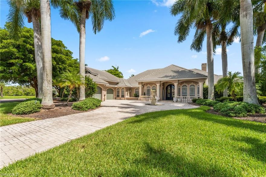 RARE OPPORTUNITY!! One owner waterfront, gulf access home nestled in THE HERMITAGE! Custom 4 bedroom, 5 bath (3, 2), den, 3 car garage, pool home built by Gulfstream Construction. This highly esteemed subdivision, consisting of just 19 exquisite waterfront home sites is located in a gated, deep water community and is considered by many to be the most exclusive address in Lee County. The 200+ft sailboat access canal will accommodate just about any size vessel. The closest direct access property to Sanibel, the Gulf, and beyond in Cape Coral. This home features a multitude of timeless finish work from custom trim and moldings, 18ft ceilings, wainscoting and stone floors.  The Socialite in you will love the commercial grade wine cellar with dual temperature control, built in bar, additional wine cave with wrought iron gate and large Kitchen Island with additional seating for 8! The saltwater infinity edge pool was completely remodeled in late 2021 including new heater, lighting, and pool pump. Large courtyard perfect for entertaining with hot tub added in 2021. Boat dock, lift & Tiki Hut. Be sure to see the upper level 4th bedroom teen/mother-in-law suite. Walk to Cape Harbour and enjoy the restaurants, bars, boutiques and endless entertainment. Your waterfront oasis awaits!!