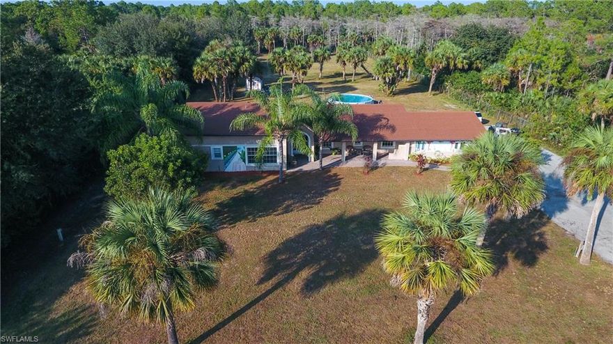 Wonderful  concrete poured construction home including roof makes this the perfect home to ease your mind, 3 bedroom plus den  2.5 bath  home with all the upgrades one might want. Vaulted ceilings throughout makes this home even more spacious than it already is. Carpeted floors  throughout with  marble under carpet throughout  carpet can easily be removed. This home has beautiful gated entrance and completely fenced  on all sides and cleared with power and 2 wells. Home is located close in which makes it a perfect location. The above ground pool is well maintained and addition to this spectacular home. Owners wants quick sale and put a $3000 bonus to selling agent for quick sale.