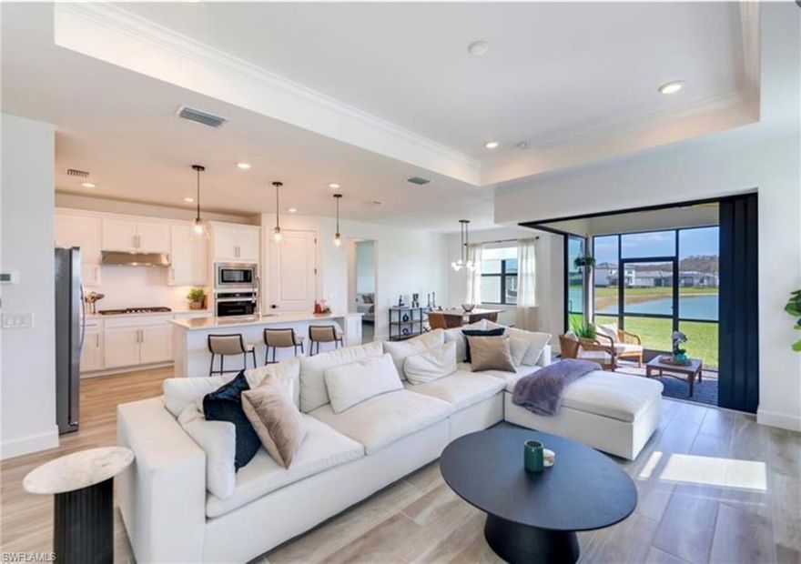 Summer 2026Special! $3950 per month! Turnkey furnished 3 bedroom plus den Pulte Mystique w/ gorgeous lake views located in the brand new resort style community of Verdana Village - just 15 mins from the Airport! This community features an INDOOR SPORTS COMPLEX w/ Pickleball, tennis & basketball! The amenities also include a state of the art fitness center, community pool, cafe, outdoor tennis and pickleball, playground & dog park! Publix Plaza with Dunkin Donuts, just outside gates, set to open in April & Old Corkscrew Golf Course just 2 miles away! This stylish, mid century-modern decorated home, features a primary suite w/king sized bed & large walk-in closet. The 2 add'l bedrooms have queen beds, to comfortably sleep 6. Separate den/office w/ a desk, to work during your stay. The homeowner has taken great care to make your stay comfortable including towels, linens, plates, glasses, silverware, even a BIKE and more! Also, for your convenience, the TVs have streaming capabilities and all utilities (up to $150/mo elec/gas) & Wi-Fi are included in the rental price! Just pack your suitcase and come enjoy this beautiful home in paradise! Available May-Dec 2025 $3950/mo.