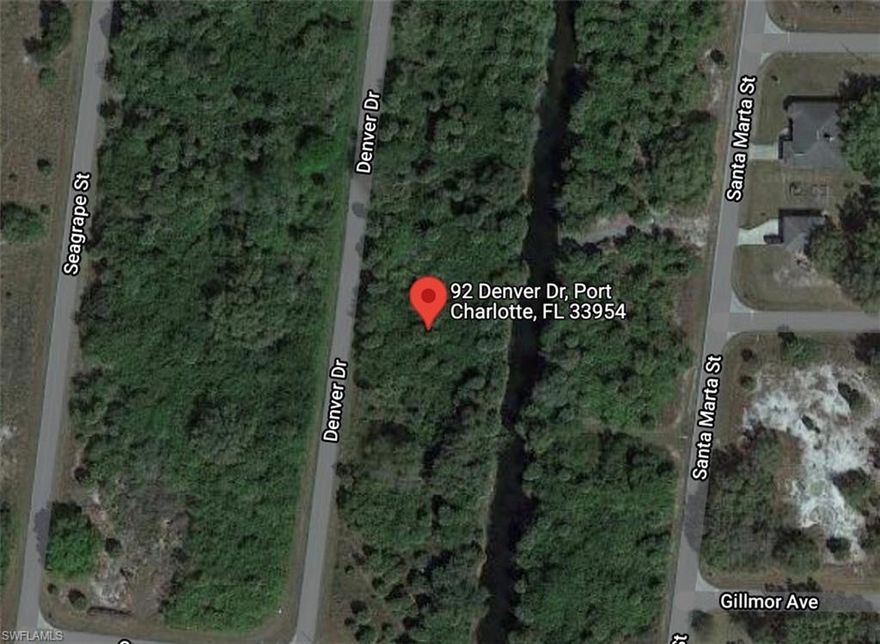 Port Charlotte Waterfront Lot near Shopping, and close to hwy 41. This neighborhood has quick access to North Port. Short distance to parks and recreational facilities and a short drive to the elementary school.