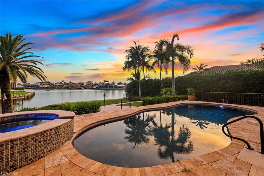 Imagine a place where watercolor sunsets and beautiful bay out to the city skyline views were an everyday luxury. This lovely, 2007-built residence in the prestigious Estates area is situated on nearly a half-acre key lot with sunny, southwestern exposure and 210 feet of direct access to the water frontage on Smokehouse Creek. Offering over 3,000 air-conditioned square feet with four en-suite bedrooms plus den, 4.5 baths, a light and bright floorplan with volume ceilings, Control4 system and more. Enjoy the picturesque backdrop of the bay, marine wildlife and boats from your spacious, open lanai with pool and spa, and summer kitchen. What makes the property extra special is due to the depth of the lot and the positioning of the dock, you are able to have a large backyard with a nice, brick-paver patio and an unspoiled view of the tranquil surroundings. Quick, direct access from your boat dock and lifts out to the Gulf of Mexico, 10,000 Islands and endless sightseeing and adventure. See attached for additional improvements.