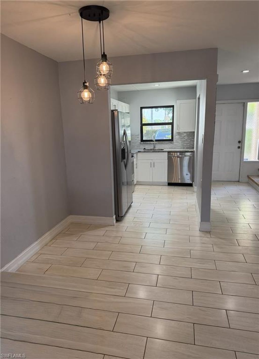 Photo of 26560 Southern Pines DR #105, BONITA SPRINGS, FL 34135 (MLS # 225083919)