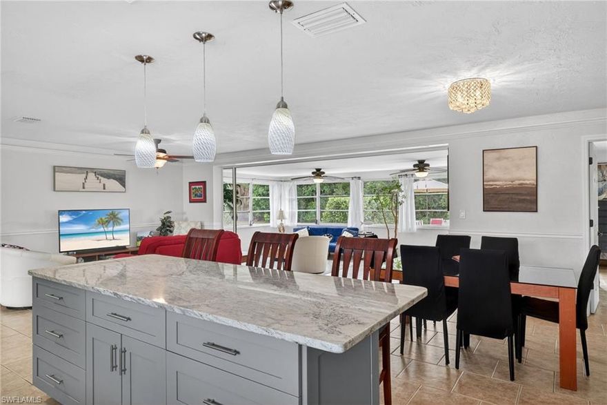 Welcome to the heart of Cape Coral’s highly sought-after Yacht Club area, where this light-filled home sits on a rare TRIPLE lot offering space, flexibility, and long-term value with a private backyard. Just minutes from Bimini Basin, Jaycee Park, the Yacht Club, the energy of Downtown Cape Coral, and within walking distance to the beach—this location is ideal for boating, biking, dining, and enjoying the Southwest Florida lifestyle. The split-bedroom layout offers a comfortable, welcoming feel with a bright living area open to dining and a spacious kitchen with island, ideal for everyday living and entertaining, while the large sunroom adds versatile living space. The expansive triple lot provides room for a southern-exposure pool or future expansion, creating an ideal setting for outdoor enjoyment. Recent updates include a new AC in 2025, primary bedroom windows in 2025, dishwasher and stackable washer/dryer in 2023, and an updated electric panel in 2023—making this an excellent opportunity to enjoy one of Cape Coral’s most desirable neighborhoods.