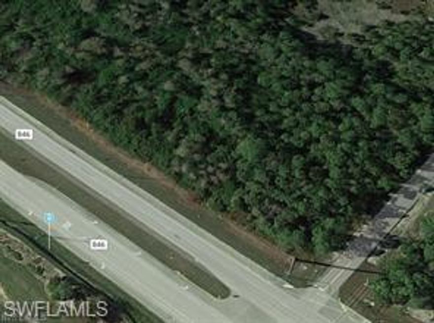Great buildable oversized 3.62 corner lot with Immokalee Rd frontage. LOCATION!!! Located at the corner of Immokalee Rd and 39th Ave NE just opposite the Fairgrounds and the upcoming park and in close proximity to the Shady Hollow preserve and the Publix on Randall. Environmental study shows 50% wetland, but lots of buildable space along the 39th Ave and in the center of the lot (environmental study attached to the listing). A great opportunity to build a home that has enough privacy while located close to all the infrastructure. Lots of space with NO restrictions or HOA fees!