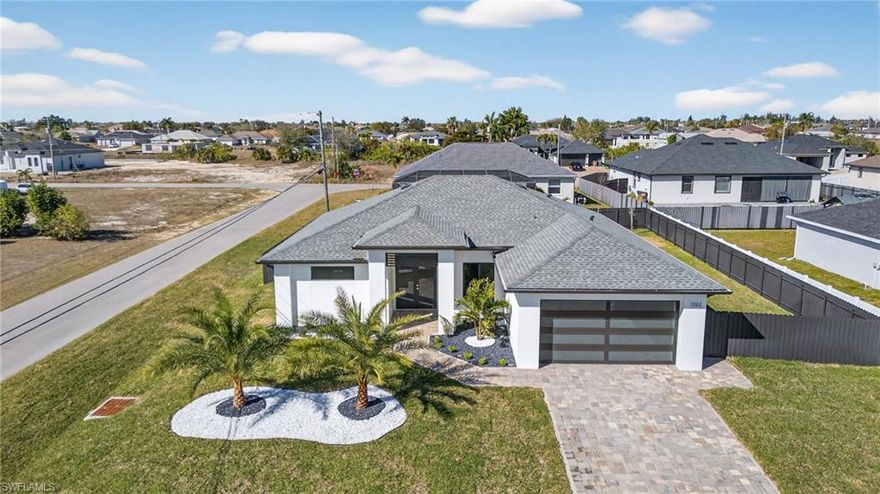 This new construction, pool home with 4 bedrooms and 2 bathrooms, is ready for a family to call their own! The open concept floor plan with 12 feet ceilings provides a bright space with plenty of natural light. Modern touches throughout the home include porcelain tile, quartz countertops, custom kitchen and closet cabinet and a beautiful soaking tub! The home offers hurricane impact doors and windows as well as a glass hurricane impact garage door ensuring safety and peace of mind. The outdoor oasis features a wet bar and a pristine pool with a sun shelf, perfect for entertaining or relaxing under the Florida sun. Centrally located, this property offers convenient access to groceries stores, restaurants and schools, all within a 5-minute drive. The home is not located in a flood zone and has city water and sewer. Schedule your private showing today!