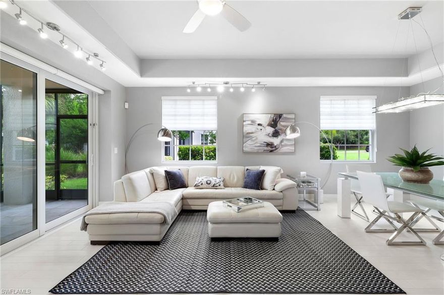 Welcome to this beautifully appointed coach home in the desirable gated community of San Marino at Miromar Lakes. This spacious first-floor residence offers 3 bedrooms, a dedicated office with custom built-ins, 2 bathrooms, and an open floor plan designed for both comfort and entertaining.

The heart of the home is the light-filled great room, where large windows create a bright and airy ambiance. The kitchen features ample counter space, upgraded cabinetry, newer appliances, and a convenient breakfast bar that flows seamlessly into the dining and living areas. A screened lanai with northwest exposure provides a tranquil space to relax while enjoying peaceful lake views and stunning sunsets.

The primary suite is a private retreat, complete with dual vanities, a soaking tub, a walk-in shower, and generous closet space. All of the closets throughout the home have been thoughtfully designed with California Closets. Two additional bedrooms, along with a guest bath, provide plenty of room for family and visitors. The built-in office with custom storage adds function and flexibility, while a two-car garage and multiple storage options throughout the home ensure everything has its place. Gracefully set on a corner, this residence benefits from an elevated level of privacy and peace.

Additional features include a newer AC system, ensuring efficient comfort year-round, and modern appliances in the kitchen for ease and convenience.

Residents of San Marino enjoy access to a private neighborhood pool and the award-winning amenities of Miromar Lakes Beach & Golf Club, the #1 community in the United States. Here, every day feels like a vacation with three miles of white sandy beaches along a 700-acre freshwater lake, where you can enjoy boating, paddleboarding, kayaking, fishing, and swimming. The stunning Beach Club offers infinity-edge pools, private cabanas, and beachside dining, while the Marina provides boat rentals and docking.

Wellness and recreation are at the heart of Miromar Lakes living, with a full-service spa, state-of-the-art fitness center, tennis, pickleball, and bocce courts. Residents also enjoy a year-round calendar of social events, themed dinners, live entertainment, and activities designed to bring neighbors together. For dining, the community features several gourmet restaurants, from casual lakeside bites to elegant fine dining experiences.

This is a rare opportunity to experience resort-style living every day in one of Southwest Florida’s most celebrated communities.