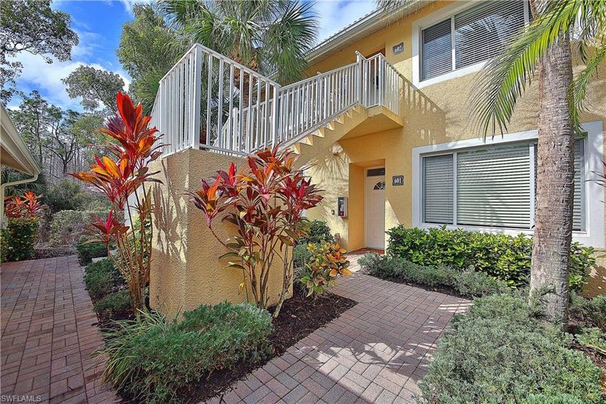 Immaculate first floor 3 bedroom 2 bath 1 car garage lakefront carriage home in North Naples.  This end unit built in 1999 boasts almost 1900sf of living area, huge kitchen with solid surface countertops, large living area with high ceilings, tile throughout,  spacious master bedroom and bathroom with tray ceilings, loads of outdoor living space on the lanai which has roll downs shutters, two sitting areas and overlooks the lake and preserve.  This pet friendly community has lush landscaping, tile roofs, community pool and is close to so many restaurants, shopping and beaches!