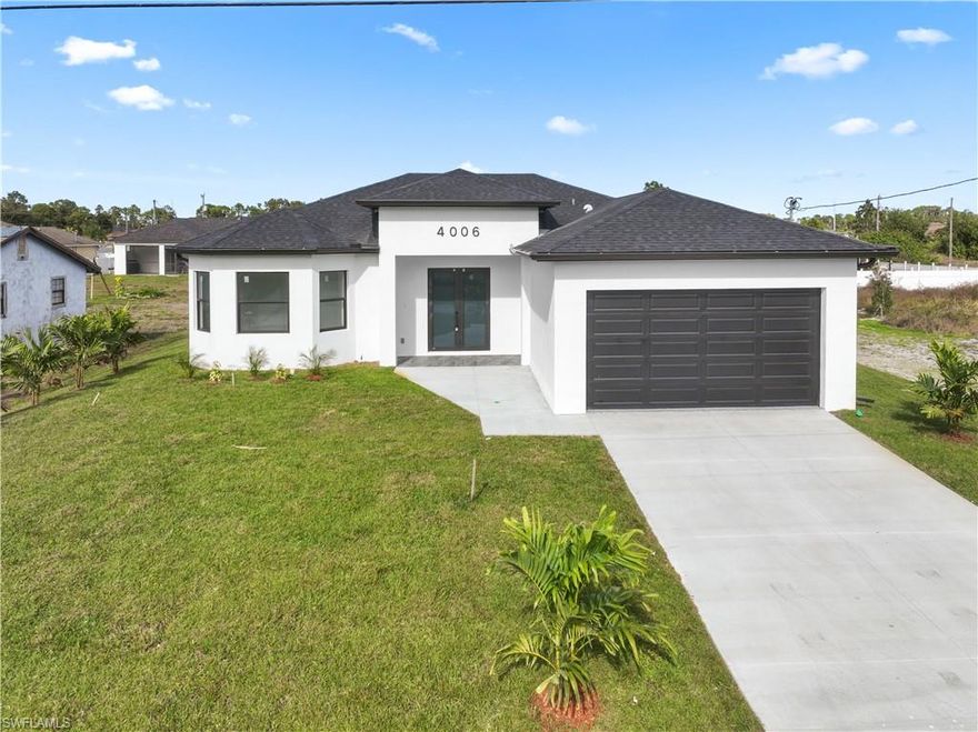 Welcome to this stunning and beautiful new 2026 home on a spacious lot in one of the fastest-growing areas of Lehigh Acres, Florida. This home features  4 bedrooms, 2 bathrooms, a large master bedroom, and custom closets. Enjoy the spacious kitchen with an island that adds a touch of elegance to the modern kitchen with new stainless steel appliances. High ceilings with abundant natural light. This beautiful property offers a wealth of features, including LED lighting throughout the home. Impact-resistant doors and windows, a 2-car garage, and a washer and dryer included in the laundry room. The interior features of this home are one of a kind. Not finding the perfect home? Trust me, this is everything you're looking for. Ready to show.