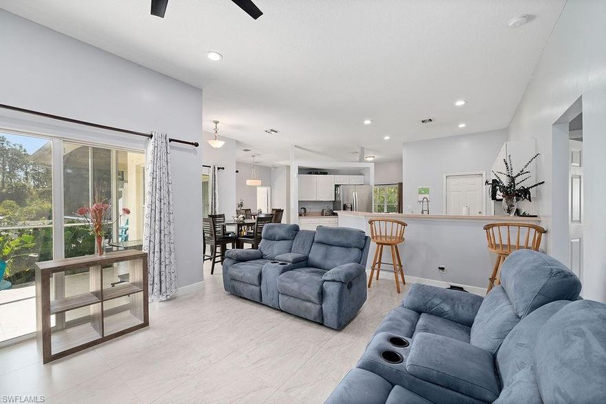 Step into this meticulously kept home with tons of privacy!!!! Featuring 4 Bedrooms, 3 baths and 2 car garage. The master offers plenty of space with a separate shower and jetted tub. The 3 guest rooms are of great size. The kitchen is open to the living room which makes it a great home for entertaining with Stainless steel. PACKED WITH EXTRAS!!! This home is centrally located in a well kept neighborhood on a very PRIVATE DOUBLE LOT!!!!! Great curb appeal with a manicured lawn. Minutes from schools, the Park, I-75, and Fort Myers!! SETUP YOUR PRIVATE SHOWING TODAY!!