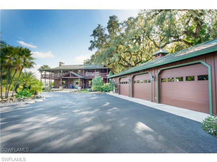 Own a piece of true, Old Florida charm. Hickey's Creek Ranch is not just a house in a gated neighborhood, but the genuine article. As you pass through the understated but grand entry the paved driveway and four board fence deliver you to a ranch house with all the comforts and amenities to which you've become accustomed. It is as if the epic tale of cattle barons and outlaws of 'A Land Remembered' sprung to life on a carefully assembled 34+/- acres. A large pond, approximately 930' of frontage on Hickey's Creek, large Live Oaks draped in Spanish Moss with 7 pastures all with custom fencing. 29 out of the 34 acres is fully irrigated and operated by a John Deere Diesel Pump. The residence was completely remodeled in 2000 consisting of 3 bedrooms, 3 full baths and large den downstairs. Gorgeous stone fireplace and hardwood floors. Wrap around porches on both 1st and 2nd story. The size of this property makes it the perfect combination of ranch and home. It is small enough to maintain yet large enough to ensure there is a space for everything. Meticulously maintained and thoughtfully outfitted. Appraisal done 11/2014, came in well above the asking price.