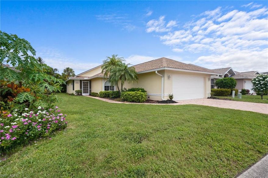PRICE REDUCED, LOWEST PRICED HOME in Palm Island, an established gated boating community just west of US 41, minutes to downtown Fort Myers.  Less than a mile from Publix, restaurants, CVS, UPS store.  This two bedroom, two bath home with a den is on a quiet cul de sac street.  Bright, white kitchen with breakfast nook.  Western exposure creates lots of natural light. Screened in lanai and patio.   Custom window treatments in kitchen and living room. Back lanai is screened.  Pull down stairs in attic for additional storage.  Electric hurricane shutters and manual ones for smaller windows.  New roof in 2022. Newer Maytag washer and dryer.  NOT in a flood zone.  No flooding through any of the hurricanes. Special place to park an RV or boat.  Low monthly maintenance fees of only $255. a month includes all of the yard work including mulching and trimming.  
Community has a boat ramp, beautiful pool and hot tub, boat storage, game room with pool table and a fitness room.  Tennis courts.  Active community.   A beautiful community room is complete with a kitchen for private parties and functions. Space for your boat or RV storage upon availability.  
This friendly community is great for your home or winter escape and the perfect paradise spot in Southwest Florida
