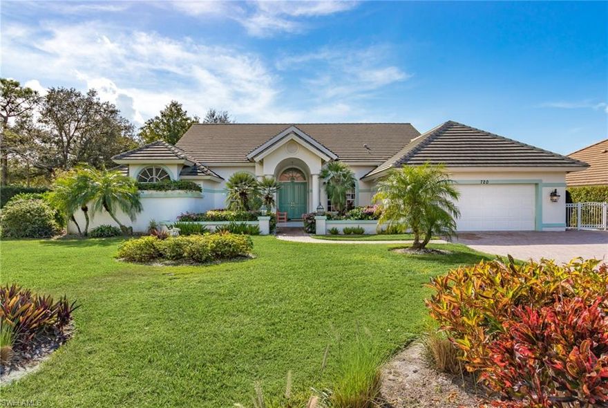 Nestled on a desirable corner lot in the prestigious Pelican Bay community, this beautifully appointed 3 bedroom + den, 3 bathroom home is the ultimate Florida home. Tastefully decorated with modern touches, the kitchen features stainless steel appliances, a wall oven, a cozy eat-in nook, and a spacious breakfast bar. The elegant light-filled dining room comfortably seats six. French doors open to the primary suite, with a king-sized bed and patio access leading directly to the serene pool area. The luxurious primary bath boasts a soaking tub, walk-in shower, and expansive dual vanities. Guests will enjoy the thoughtfully styled bedrooms one with twin beds, the other with a queen while the versatile den offers dual workstations and a trundle bed for additional sleeping space. The warm and welcoming family room, anchored by a charming fireplace, is the perfect place to unwind with a glass of wine. Outside in the private oasis lush landscaping surrounds the tranquil pool and spa. Residents of Pelican Bay enjoy exclusive access to a private beach with complimentary chairs, umbrellas, and cabanas. Additional community features include beachfront dining, a state-of-the-art fitness center, tennis courts, scenic walking and biking paths, and more all just minutes from Waterside Shops, Mercato, and Artis Naples Philharmonic. Live exceptionally in Pelican Bay.