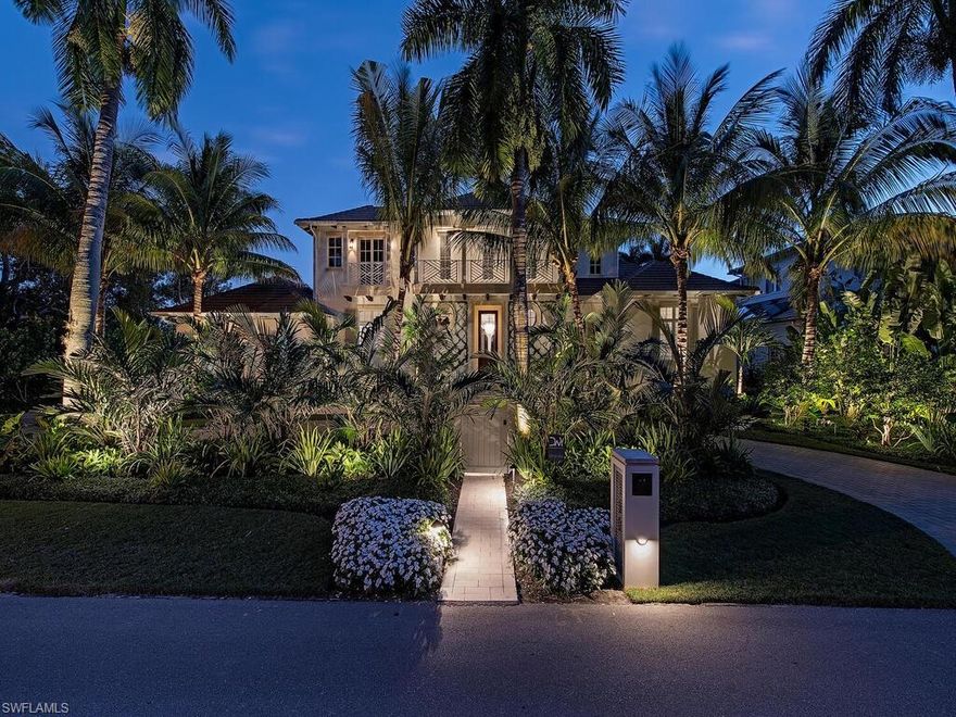 Located in the heart of Olde Naples on the corner of Gordon Dr. & 16th Ave S., this 2-story  contemporary, coastal-style estate sits on a lakefront corner lot just steps from the Gulf of Mexico. Designed by John Cooney & built by BCB luxury home builders, this home has exceptional quality construction & attention to detail. Exquisite light-filled, open concept, clean & sophisticated style with cool neutral tones, wide plank wood, marble & tile flooring, high tray & beamed ceilings & custom moldings & woodwork as well as incredible 448 bottle glass enclosed wine divider! This is the cleanest resale on the market with 5 bedrooms plus office, 5.5 bathrooms, 5,032 sf under air & an oversized 3 car garage with room for lifts. Floor-to-ceiling impact resistant sliders open to the expansive outdoor entertaining area with full summer kitchen, heated infinity edge pool & spa, 69' composite wood dock & fire pit. Luxurious 1st floor master with 2 walk-in closets & spa-like master bathroom complete with 2 showers, dual vanities & soaking tub. Guests will appreciate the 2nd floor family room & 3 guest suites. Professionally designed with hand-selected & European furnishings.