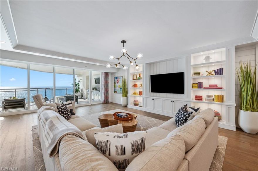 Exquisite 10th-Floor Residence at Moraya Bay. Gorgeous elevator entrance with marble and wood floor inlay, and wood floors throughout — offering over 4,500 sq. ft. of refined interior living and more than 700 sq. ft. of stunning outdoor space.
Welcome to elevated coastal living in this fully reimagined (2022) 10th-floor residence at the exclusive Moraya Bay. This rare 3-bedroom + den retreat delivers sweeping Gulf and Bay views from every room, immersing you in the beauty of turquoise waters and fiery sunsets. A rare combination of style, scale, and direct beachfront access, this residence defines luxury living in Naples.
Thoughtfully redesigned with a focus on both form and function, this elegant home showcases custom built-ins, refined wall textures, and detailed ceiling treatments that elevate every space. The open-concept layout is anchored by clean lines and designer finishes, while floor-to-ceiling glass invites abundant natural light and uninterrupted panoramic views from sunrise to sunset.
The gourmet kitchen and butler’s pantry are a dream for culinary enthusiasts and entertainers alike. Outfitted with top-tier appliances and natural gas cooking, including two dishwashers, two refrigerators, a wine cooler, and an ice maker, this space is designed to impress. The seamless flow into the great room and dining area allows for effortless hosting and everyday living.
The owner’s suite is a luxurious private escape featuring a spa-like bath with dual showers, dual water closets, and exquisite materials throughout. A custom walk-in display closet offers elegance and organization, while a secure owner storage area adds peace of mind.
The expansive lanai—with over 700 sq. ft. of outdoor living space—features a full summer kitchen, ideal for entertaining or simply enjoying Naples' iconic sunsets and tranquil Gulf breezes. Whether you’re dining al fresco or lounging with a cocktail, this outdoor sanctuary is unforgettable.
Two spacious guest suites provide a haven for friends and family, each designed with comfort and privacy in mind. The flexible den offers the perfect setting for a media lounge, office, or overflow guest space—tailored to your lifestyle.
Moraya Bay offers a premier resort-style experience with a private beach club for residents, including beachside and poolside service and a beautifully appointed restaurant overlooking the Gulf. Through the Multi-Club membership, residents also enjoy access to the exceptional amenities at Kalea Bay—featuring additional dining, guest suites, a state-of-the-art wellness center, tennis, pickleball, and more. This is more than a residence—it’s a lifestyle. A Gulf-front sanctuary where every detail is elevated, and every day feels like a five-star vacation.