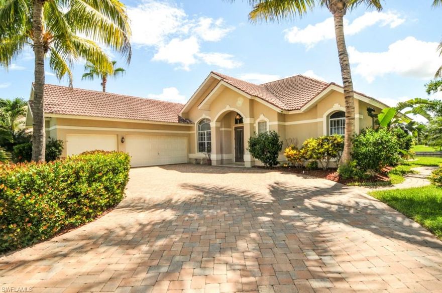 Bring your SAILBOAT or YACHT because there are NO BRIDGE RESTRICTIONS to the RIVER with this IMMACULATE, beautifully landscaped GULF ACCESS home on Cape Coral's prestigious PENINSULA POINT. Enjoy wide INTERSECTING CANAL VIEWS and gorgeous sunrises from your brand NEW POOL and SCREENED and PAVERED LANAI!!  This TILED ROOF home is IMPECCABLY maintained and lovingly furnished with a wonderful "WELCOME TO PARADISE" flair. The airy master suite with its HARDWOOD floor opens on to the COVERED screened lanai overlooking the WATER. What a great place for morning coffee! Enjoy entertaining guests and family from the well equipped and spacious kitchen. The side load TRIPLE GARAGE is also perfectly ship shape including an epoxy floor and is truly a BONUS for hobbies and storage. MOTORCYCLES or your HOT ROD! Peninsula Point is a CUL-DE-SAC street that offers a peaceful, secluded setting!