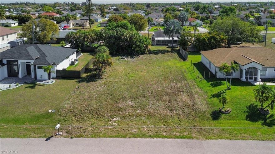 Prime opportunity to build in a rapidly growing area of Cape Coral! This residential lot is already equipped with city water, sewer, and irrigation connections in place saving you time and upfront development costs. (Buyer to assume any remaining utility balance.)

Surrounded by ongoing development and new construction, this location offers convenient access to parks, recreational amenities, shopping, dining, and Cape Coral’s renowned waterfront lifestyle. Enjoy proximity to scenic waterways and everything that makes Southwest Florida living so desirable.

Whether you're planning to build your dream home or secure a smart investment in an expanding market, this property presents excellent potential.

Don’t miss your chance to own in one of Cape Coral’s most up-and-coming areas—reach out today for more details!