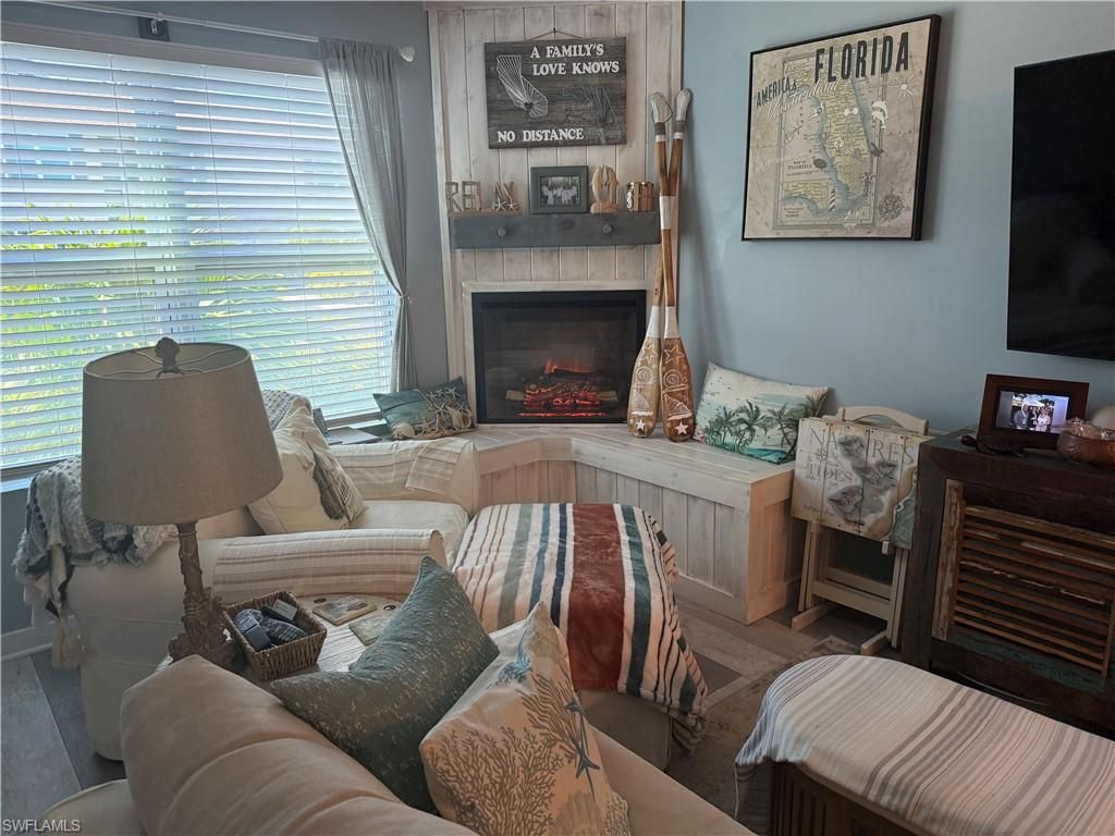 Photo of 731 W Elkcam CIR #A102, MARCO ISLAND, FL 34145 (MLS # 226017453)