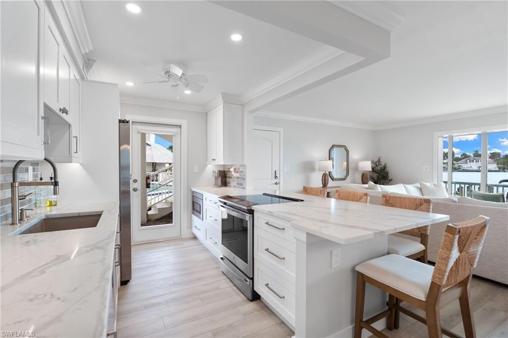 Photo of 322 Harbour DR #103A, NAPLES, FL 34103 (MLS # 225084890)