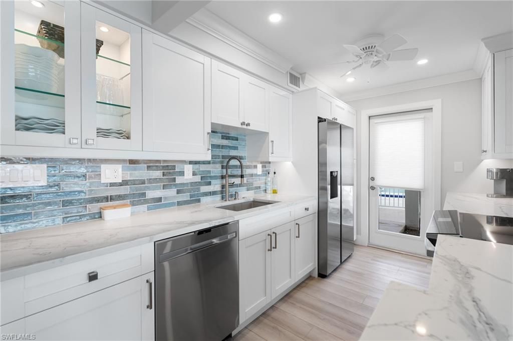 Photo of 322 Harbour DR #103A, NAPLES, FL 34103 (MLS # 225084890)