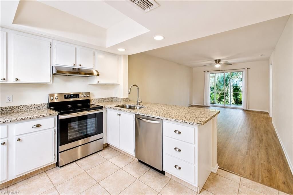 Photo of 2385 Naples Trace CIR #2, NAPLES, FL 34109 (MLS # 226020873)