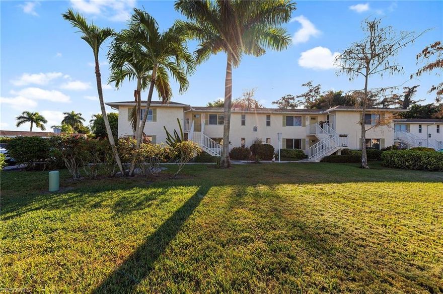 Welcome to The Glades Golf & Country Club, where comfort, convenience, and resort-style living come together in this highly desirable first-floor Esplanade model with two-bedroom, two-bath condo.  This spacious residence offers effortless living with no stairs and an inviting, open layout ideal for both relaxing and entertaining. The thoughtfully designed floor plan features a bright living and dining area, a well-appointed kitchen, and generous bedroom suites that provide privacy and comfort for owners and guests alike. The main bathroom has been newly renovated, featuring new vanities and a beautifully tiled shower, adding a fresh, modern touch to the primary suite. Step outside to the screened lanai and enjoy the peaceful surroundings, perfect for morning coffee or evening unwinding.  Located within one of Naples’ most sought-after bundled golf communities, residents enjoy unlimited access to two beautifully maintained golf courses, multiple community pools, pickleball, tennis, bocce, and an active clubhouse with dining and social events. Just minutes from downtown Naples, Fifth Avenue South, and the area’s world-famous beaches, this first-floor condo is ideal as a full-time residence, seasonal retreat, or investment opportunity.  Experience the best of Florida living - elegant, and right at your doorstep.  Come live in paradise!!