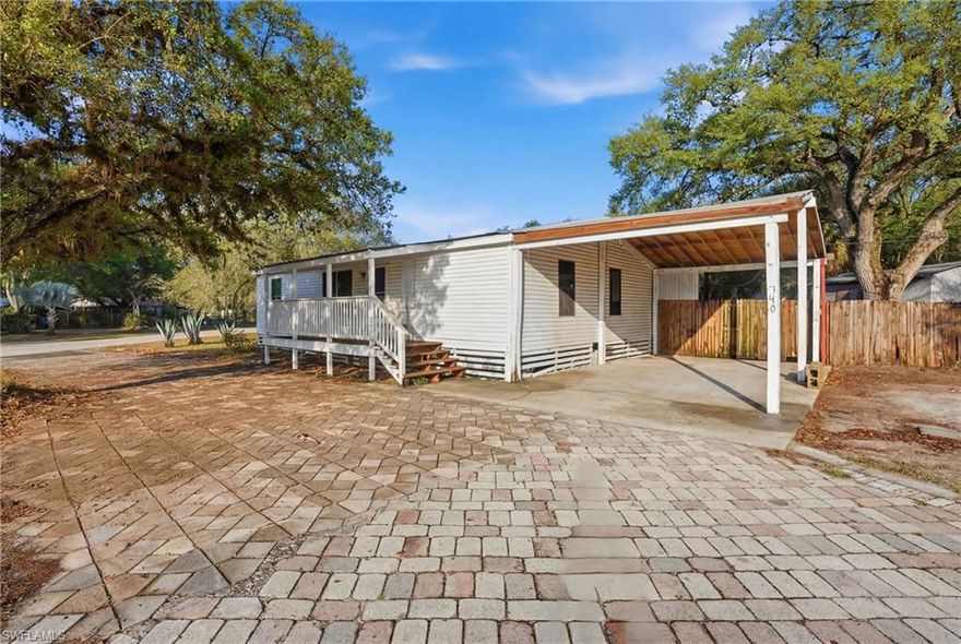 Located in the heart of LaBelle, this corner-lot property presents a prime opportunity for investors or buyers seeking a cash-only fixer-upper with endless potential. Featuring an extended paved driveway, covered carport, front porch, and a fully fenced yard with additional storage in the backyard, this property offers a solid foundation to bring your vision to life.

Inside, the home offers an open living area and a functional kitchen layout. Natural light fills the space, and the layout provides a great starting point for renovations and updates.

Conveniently located near local schools, shopping, and town amenities, this property offers both accessibility and small-town charm. Whether you’re looking to renovate and resell, create a rental, or design your own space, this is a great opportunity in a growing area.