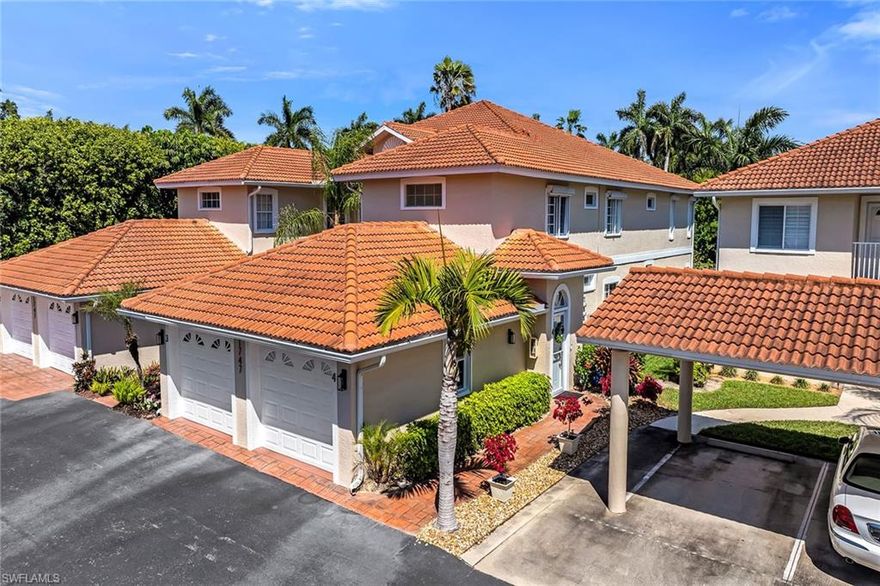 Tranquil lake views set the tone for this exceptional end-unit residence in St. George at Crown Pointe, where natural light, refined upgrades, and enhanced privacy create a serene Southwest Florida retreat. Ideally positioned to capture peaceful waterfront vistas, this beautifully updated coach home offers a rare blend of tranquility and convenience just minutes from the best of Naples living. This thoughtfully designed floor plan features three bedrooms, two baths, and a one-car garage, with new matte luxury vinyl plank marble flooring and modern 5.5-inch baseboards throughout for a clean, cohesive look. The baths are finished with white ceramic tile, while newer white interior paint, all-new lighting fixtures, ceiling fans, and a crystal chandelier elevate the home’s bright, contemporary feel. The spacious living room opens through expansive sliders to a screened lanai, creating seamless indoor-outdoor living. This covered space, complete with a ceiling fan and tranquil lake views, is perfect for relaxing or entertaining. Manual storm shutters add peace of mind. The kitchen features white cabinetry, granite countertops, recessed lighting, breakfast bar and a newer stainless steel Whirlpool appliance package. The primary suite offers lake views, dual walk-in closets, and a spa-like bath with dual sinks, a glass-enclosed shower and a separate jetted tub. A guest bedroom with dual closets and an adjacent bath provides comfort for visitors. Additional highlights include new hardware throughout, a newer LG stackable washer/dryer, roof (2020), AC (2021), and updated exterior paint, lighting and building numbers (2025). Residents enjoy a community pool, clubhouse and walking paths, with low quarterly fees of $2,450 (excluding electric). St. George residents enjoy two pools, plus clubhouse events, fitness room, pickleball, tennis, a fishing pier and the Rich King Memorial Greenway.