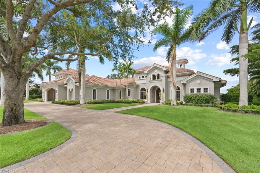 Exquisitely designed with soaring, coffered ceilings as you enter the double, glass paned front doors to the beautiful foyer offering stunning views of the craftsmanship details to the fabulous exterior views overlooking your lanai, pool/spa and to the golf course and lake beyond. Inside, you will be immersed in luxury as you enjoy a gas fireplace flanking the formal living room to the fabulous kitchen detailed with an abundance of workspace, island, and Wolf appliances and overlooking the breakfast nook and family room with zero corner sliders leading to the fantastic lanai.  There you will appreciate the built in outdoor kitchen, seating area and the lovely, coffered ceiling. The pool/spa and gas fire pit are open for wonderful starry nights and fabulous entertaining.
With 4 bedrooms, all ensuite, den and media room, you and your family and guests will appreciate the privacy of personal spaces and the 3-car garage with a portico allows plenty of spaces for your treasured vehicles.