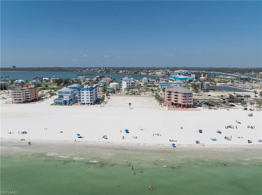 Positioned on approximately 1.72 acres of immaculate white-sand beachfront, this premier parcel offers nearly 220 feet of direct Gulf of Mexico frontage — a rare and coveted opportunity on Fort Myers Beach. With unobstructed, walk-out access to the shoreline, the site presents an ideal canvas for an exclusive high-end development such as a luxury condominium, boutique resort, or mixed-use commercial venture.

Strategically located just 0.4 miles from the newly opened Margaritaville Beach Resort and only 0.2 miles from the vibrant Times Square district and the iconic Fort Myers Beach Pier (currently undergoing a full city-led redevelopment), this property sits at the heart of Estero Island’s transformation. The surrounding area is poised for a wave of upscale dining, shopping, and entertainment venues — all of which will elevate long-term value.

Zoned for multifamily residential, tourist, and mixed-use development (pending confirmation), this Gulf-front site offers substantial flexibility and investment potential. With strong demand for luxury inventory, both for primary residences and short-term vacation rentals, the property is uniquely positioned to deliver exceptional ROI.

Easily accessible via Southwest Florida International Airport (RSW), this location appeals to both year-round residents and seasonal visitors seeking a private coastal enclave within walking distance to Fort Myers Beach’s most desirable attractions. As new development inventory remains limited, this is a truly rare opportunity to define the next chapter of refined beachfront living.