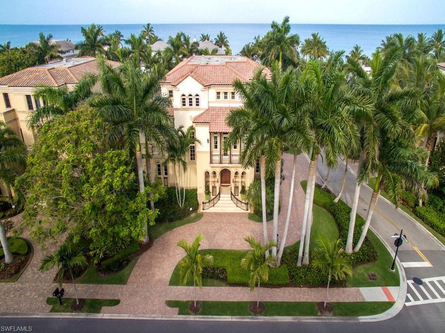 H.12011 - Just steps to the white sand of Naples beach lives a beautiful vertical home boasting custom touches that elevate this property above the ordinary. From the main living level, where the Gulf view and sunsets can be enjoyed, to the central location allowing comfortable strolls down Fifth Ave, delivering a complete vacation experience. Each room of this residence has been carefully thought out and decorated with special finishes from Crema Marfil honed marble to hand troweled Venetian plastering. Custom millwork, coffered ceilings, paneled study, high-end lighting fixtures to a custom designed iron staircase are only some the features that make this home a special presentation. All of this and more comes neatly packaged in a property that can easily be maintained and offers a place to be enjoyed for a weekend, a season or year round.