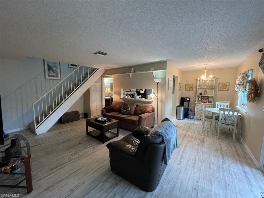 Welcome to easy, low-maintenance Florida living at 3358 Royal Canadian Trace #3, Fort Myers, FL 33907. A delightful 2-bedroom, 1.5-bathroom townhome with a 1-car attached garage in the welcoming, gated community of Provincetown. Ideal for first-time buyers, downsizers, snowbirds, or investors, this fully furnished gem is move-in ready and offers comfort, style, and unbeatable value in the heart of Fort Myers. The first floor shines with fresh luxury vinyl plank flooring in a light, wood-look finish that feels modern and bright. You'll find an open, airy great room layout perfect for entertaining: a well-appointed kitchen with all appliances included, a convenient pass-through window to the living area, a cozy dining nook, spacious living room, and a half bath with in-unit laundry for added ease. Step out to your private screened and covered lanai—ideal for morning coffee, relaxing evenings, or enjoying the Florida breeze without the bugs. Upstairs, the second floor provides privacy with two bedrooms and a full bathroom featuring updated tile work for a spa-like touch. Fully furnished and negotiable—bring your suitcase and start enjoying the lifestyle right away! Provincetown is a gated community with fantastic amenities for an active, social vibe: community pool, tennis courts, pickleball, shuffleboard, walking trails, and barbecue grills—all set amid lush landscaping. Low HOA fees keep things affordable, and the location couldn't be better: just minutes from downtown Fort Myers River District dining and events, shopping at Edison Mall or nearby plazas, Gulf beaches (easy drive to Fort Myers Beach or Sanibel), FSW College, and quick I-75 access for travel. Built in 1979 and thoughtfully updated, this townhome combines classic charm with modern touches in one of Fort Myers' most convenient and affordable gated spots. Don't miss your chance to own this turnkey treasure!