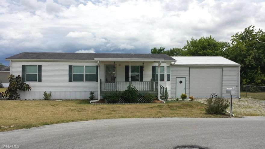 MAKE AN OFFER...OWNER FINANCING AVAILABLE!  Located in Riverfront Community within walking distance of Caloosahatchee River.  This 3 Br / 2.5 Ba manufactured home is like new and features an open floor plan, island kitchen and pantry.  The attached single car garage is an added bonus and double overhead doors to provide access from both front and back yard plus a 1/2 bath.  Owner financing available!  Call for details.