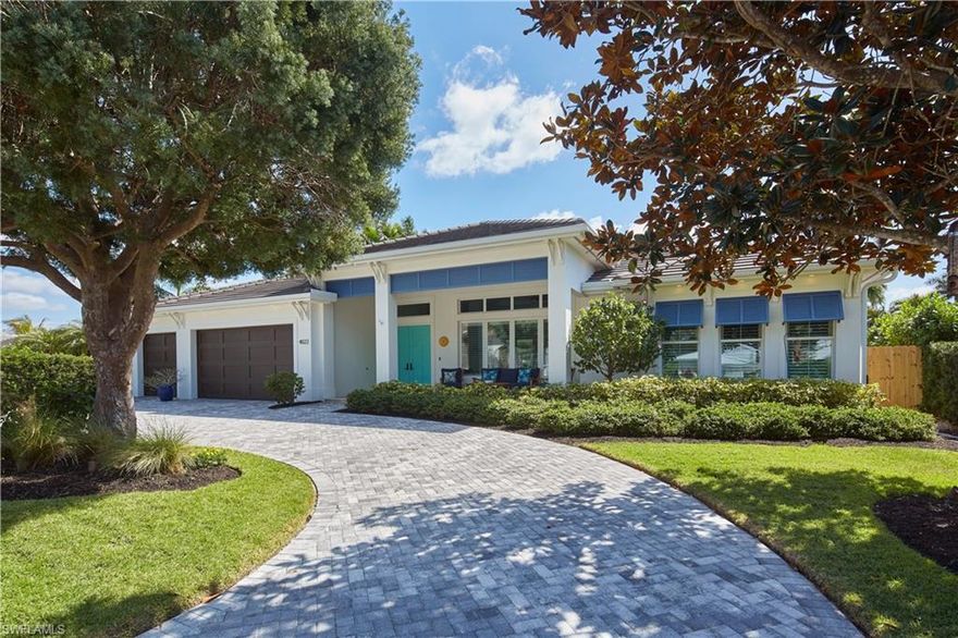 Surrounded by lively greenery and enveloped in nature's embrace, this secluded oasis is ideally located in Park Shore.