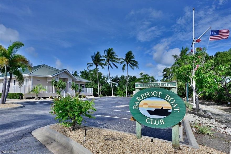 Coveted Barefoot Boat Club wet slip *with boat lift. Slip #8 of only 18 wet slips. Barefoot wet slips offer anytime access not dependent on a barn fork lift. The Barefoot Boat Club offers many on site services including ship store with ice, fuel, service sites, cleaning sites, clubhouse with pool and tiki hut available for use and personal events. This marina is located directly on Little Hickory Bay with a short walk to Barefoot Beach and access to Wiggins Pass in only minutes via boat.  Lift is 9,000 lbs currently set up for 30 foot cat, easy to set up for your boat. This slip is ready to use with no lease and a lift in place!