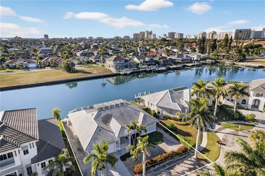 Premier Wide-Water Opportunity on Marco Island's Most Desirable locations. Breathtaking southern-exposure sunsets and quick Gulf access from the island's widest and longest waterway -- just minutes to the beach, dining, and shops. New Seawall and Dock Construction to be completed 6/15/26.
This elevated 3-bed, 3-bath residence with 10'+ first-floor elevation offers an open floor plan, oversized first-floor Primary Suite, and an expansive lanai framing sweeping wide-water views. 
For the discerning buyer, this property presents the perfect option for a stunning renovation or a signature new coastal estate on a gorgeous waterfront lot, maximizing today's most coveted design trends while capitalizing on one of Marco's ideal waterfront settings. 
Should you wish to reimagine this residence at the very highest level, we are well-equipped to provide a seamless path to unlock the best this property has to offer. Your legacy property awaits.