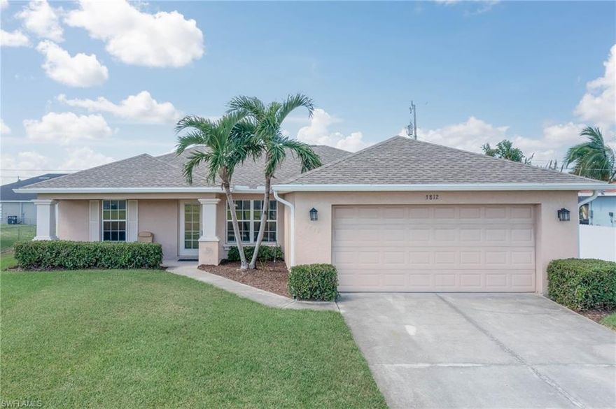 Welcome to your pool home in Southwest Cape Coral, minutes by foot to the neighborhood Walmart on Skyline Blvd. and the library. When you walk into your 3 bedrooms, 2 bath, 2 car garage home, you are greeted with a large family room that provides both comfort and a smooth flow into your dining, kitchen areas and outdoor living space overlooking the pool. You have split bedrooms with the primary on the right side of the home and your two other bedrooms on the left side with a guest bathroom which offers plenty of privacy. You can enjoy your morning coffee sitting on your screened-in paver lanai overlooking your pool and large backyard. The pool area is great for entertaining; it offers both covered space and uncovered space for sunbathing on the lanai or in the large pool. There is plenty of room for fun in games whether in the pool or the backyard! All the major home items have been taken care of; the home features a brand-new hot water heater that was replaced in October, roof is 2020, all news gutters, soffits and lanai screening in 2024 and the AC is 2017. All new interior paint! This home has plenty of closets in addition to your bedrooms for extra storage. No flooding from any of the recent hurricanes and flood policy is transferable. Great location, close to shopping and dining. Act now, this home will not last long and is looking for a new owner to put their personal touches to it.
