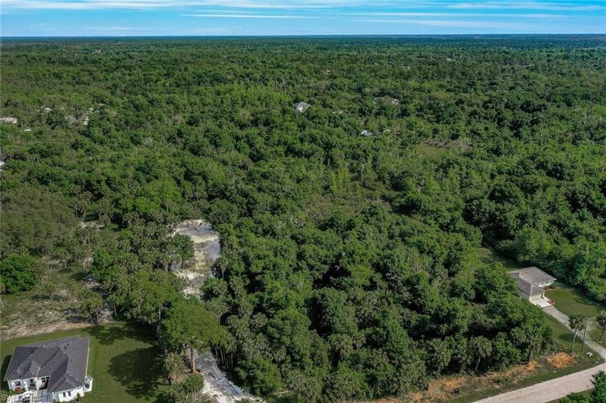 ENVIRONMENTAL PERMIT IN HAND!!  Driveway and building envelope have been mostly cleared and filled already!!  Ready to pull building permits and construct your dream house on this super private 5 acre parcel.