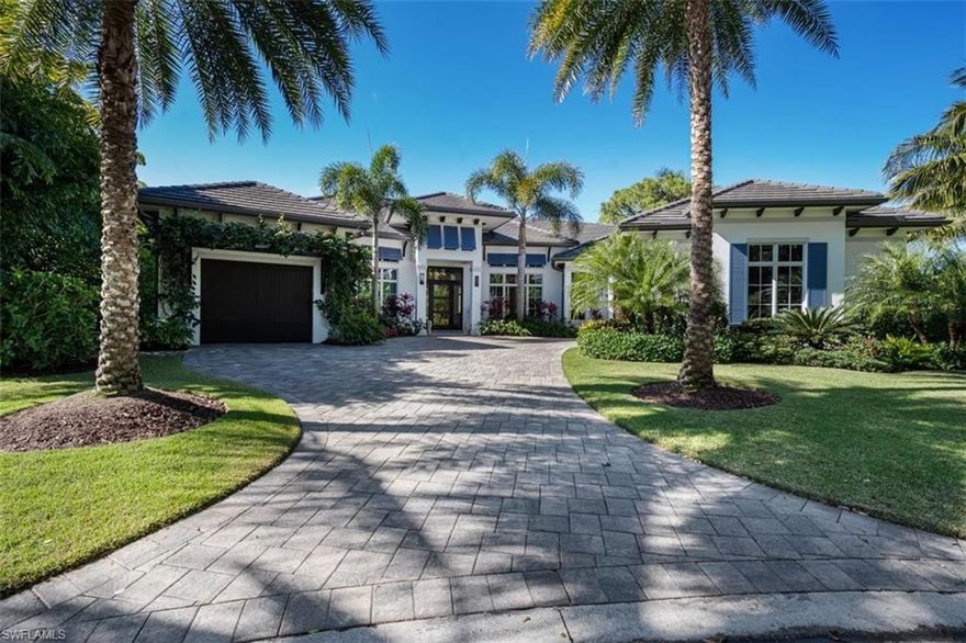 A delightful retreat in paradise! This classic British West Indies home, tastefully enhanced with 21st century luxury, is located on a beautifully landscaped cul-de-sac in the heart of Pelican Bay. The open and inviting floor plan overlooks the expansive, lush, private backyard with a 45 ft resort style pool, infinity edge spa and spacious entertainment/dining area made complete with a fire pit and 2 outdoor showers. All with a coveted Southern exposure.

The chef’s kitchen is beautifully appointed featuring inset custom cabinetry, quartzite counters, Wolf/Sub-Zero appliances and built-in Miele coffee station. This stunning home offers four en-suite bedrooms, office, custom wine bar and a 3-car garage. French white oak flooring and superior quality finishes throughout makes this luxurious lifestyle complete.

Pelican Bay offers two private beach clubs with miles of white sandy beach, two restaurants, complimentary chair and umbrella service, community center with state-of-the-art fitness center, spa and 18 Har-Tru tennis courts. The amenities and active lifestyle of Pelican Bay cannot be beat - carefree living at its best!