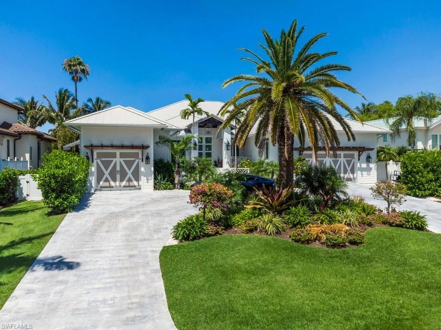 Captivating & grand, this desirable Western exposure canal front home with Bay views and water flow through Venetian has been completely re-built with every detail professionally designed by Stofft Cooney-2019. This location offers the closest proximity to the beach, one street away. This home has the LARGEST dock in all of Seagate & private beach memberships are available. Features include a custom mud set Italian sand blasted marble driveway, expansive courtyard/front porch, 2019 custom color metal roof, mosquito misting system, generator, outdoor kitchen and retractable awning, mud set sand blasted marble around pool, full exterior surround sound (including dock), a Crestron whole house audiovisual and Sonos audio system throughout with voice automated Smart home technology, Custom hard wired window treatments, gorgeously renovated bathrooms, a custom stone entrance foyer wall & designer feature entertaining wall, wide plank smoked oak floors, custom ceiling details, designer light fixtures, custom designed Kitchen with a 60” double oven Viking range & built-in Thermidor refrigerators and MUCH more!
Enjoy luxe living, sand, surf & unforgettable sunsets in this stunning home.